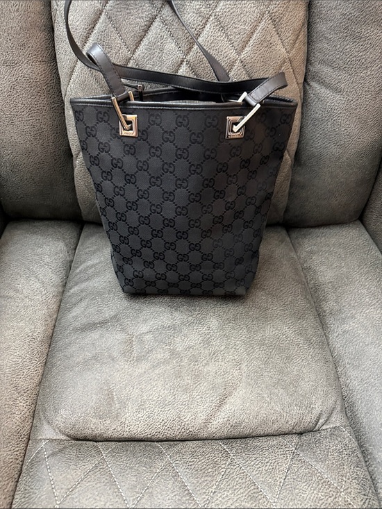 Gucci Handbags - Gucci Black GG Supreme Shoulder Bucket Bag